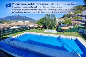 a villa with a large swimming pool at La Casita de Isabel, Near Ronda, Sierra de Grazalema in Montecorto