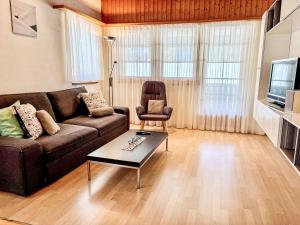 a living room with a couch and a coffee table at Apartment Diana by Interhome in Münster