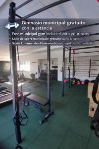 a gym with a bunch of equipment in a room at La Casita de Isabel, Near Ronda, Sierra de Grazalema in Montecorto