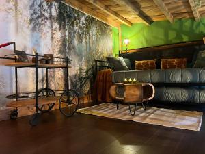 a room with a bed and a bike in it at La Découverte Trouvée in Auxon