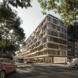 a rendering of a building with cars parked in front at Intelier Malvarrosa Plaza in Valencia +85 photos