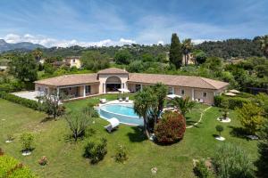 an aerial view of a house with a swimming pool at Villa Sole Flats in Saint Paul de Vence