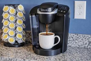 a coffee maker is making a cup of coffee at New Studio- 2 beds 7 mins to DT in Nashville +18 photos