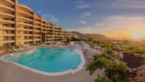 a view of a resort with a swimming pool at Anfi del Mar Tauro Golf 1 Emerald Club in Mogán