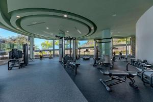 a gym with treadmills and cardio equipment in a building at Anfi del Mar Tauro Golf 1 Emerald Club in Mogán
