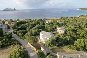 an aerial view of a town with the ocean at Villa MARINE in Ersa