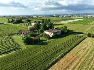 an aerial view of a farm in the middle of a field at Corte di Maggio B&B in Imola