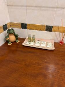 a tray of food on a wooden table with money at La Madre Abadesa, Casa en Casco Historico in Tordesillas