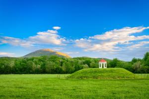 a small building on top of a green hill at Bavarian Brook Unit 6 in Helen