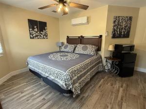 a bedroom with a bed and a ceiling fan at Rivers Edge 703A in Helen