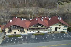 a large house with a large red roof at Rivers Edge 703 in Helen
