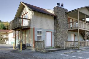 a building with two balconies on the side of it at Bavarian Brook Condo 11 in Helen