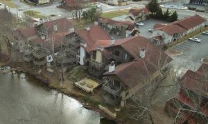 an overhead view of a house next to a river at Bavarian Brook Unit 6A in Helen