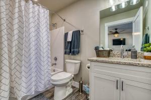 a bathroom with a toilet and a shower and a sink at Red Rock Views Tiny Suite Kanab Basecamp in Kanab