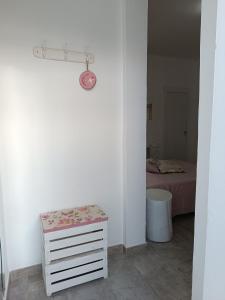 a bedroom with a bed and a white dresser at Sottovento Marzamemi Rooms&Relax in Marzamemi +82 photos