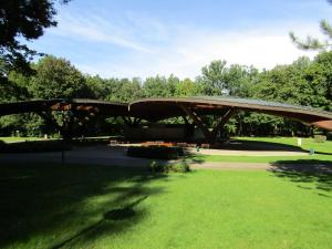 a pavilion in a park with green grass and trees at BaLa Suites Apartment House in Bad Lausick