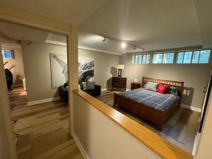 a bedroom with a bed and a large window at Spacious 4-Bedrooms Friendly House-Pool-Parking in Markham +31 photos