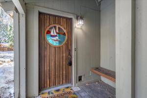 a door with a picture of a boat on it at Dollar Point - Observation Dr, home in Tahoe City