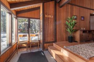 a room with wooden walls and a potted plant at Dollar Point - Observation Dr, home in Tahoe City +16 photos