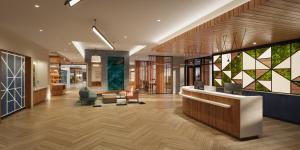 a lobby of a building with a reception desk at EVEN Hotel Orlando Universal Blvd by IHG in Orlando +47 photos