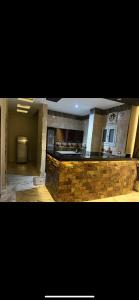 a kitchen with a stone counter top in a room at Nile palace apartment in Luxor +7 photos