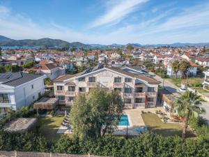 an aerial view of a residential neighborhood with houses at Kalender Pansiyon Fethiye in Fethiye
