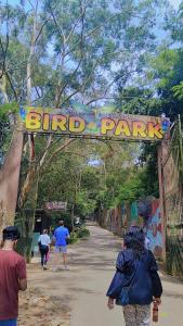 a sign at the entrance to the bird park at Shalom breaze in Gettapola