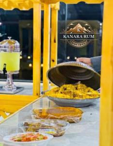 a glass table with some food on top of it at RUM KANARA BUBBLE lUXURY CAMP in Wadi Rum +19 photos