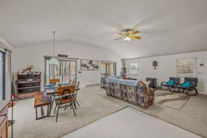 a living room with a couch and a table at Namba Cabin - Feel the Bliss in Morton Grove +24 photos