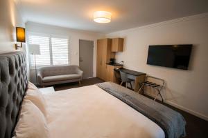 Postel nebo postele na pokoji v ubytování Quays Hotel