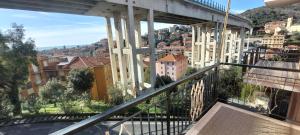 a balcony with a view of a city at Appartamento PANORAMA N 4 POSTI LETTO in Varazze
