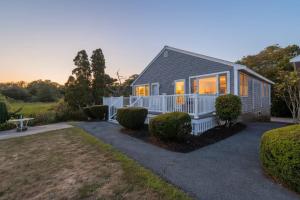 a tiny house in the middle of a yard at Coastal Bliss in Rye