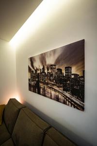 a black and white picture of a city on a wall at Residenza La Chiave in Mantova