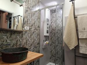 a bathroom with a shower and a sink at lovely vintage apartment climatizzato inalpi in Turin +6 photos