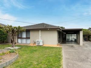 a house with a lawn in front of it at Weekend Escape in Rosebud