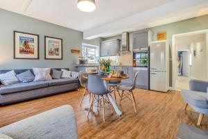 a kitchen and living room with a couch and a table at 2 Bed in Bentley oc-thpo in Bentley