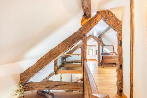 a staircase in a house with wooden beams at 2 Bed in Bala oc-82768 in Llandderfel