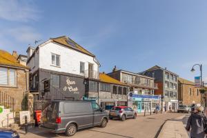 a city street with cars parked on the street at 2 Bed in St. Ives oc-p00568 in St Ives