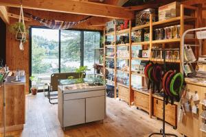 a shop with a counter in a room at Tiny Garden Tateshina in Chino