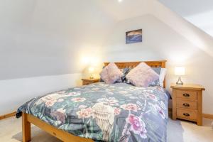 a bedroom with a bed and two night stands at 2 Bed in Big Sand oc-d33686 in Big Sand