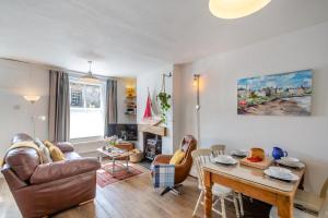 a living room with a couch and a table at 2 Bed in Beaumaris oc-wai218 in Beaumaris