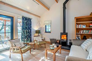 a living room with a couch and a fireplace at 1 Bed in Builth Wells oc-p27441 in Builth Road
