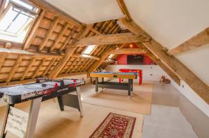 a attic room with a ping pong table in it at 4 Bed in Cray oc-bow288 in Cray