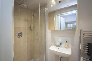 a bathroom with a shower and a sink and a shower at 1 Bed in Bath oc-bhr48 in Bath +19 photos