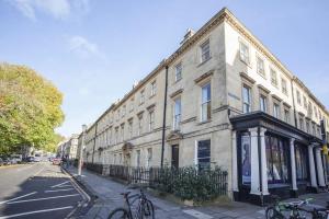 a large building on a street with bikes parked outside at 1 Bed in Bath oc-bhr48 in Bath