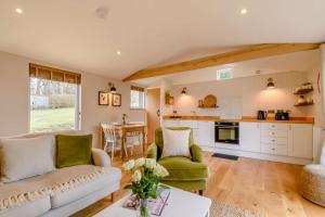a living room with a couch and a table at 1 Bed in Wadhurst oc-tw673 in Wadhurst