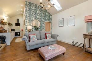 a living room with a couch and a table at 1 Bed in Wycliffe oc-t29946 in Wycliffe