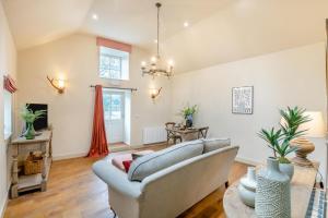a living room with a couch and a table at 1 Bed in Wycliffe oc-t29946 in Wycliffe