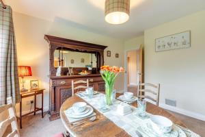 a dining room with a table and a mirror at 2 Bed in Renwick oc-h34195 in Renwick
