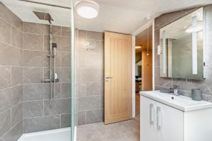 a bathroom with a shower and a sink at 3 Bed in Stackpole oc-c27398 in Stackpole Elidor +19 photos
